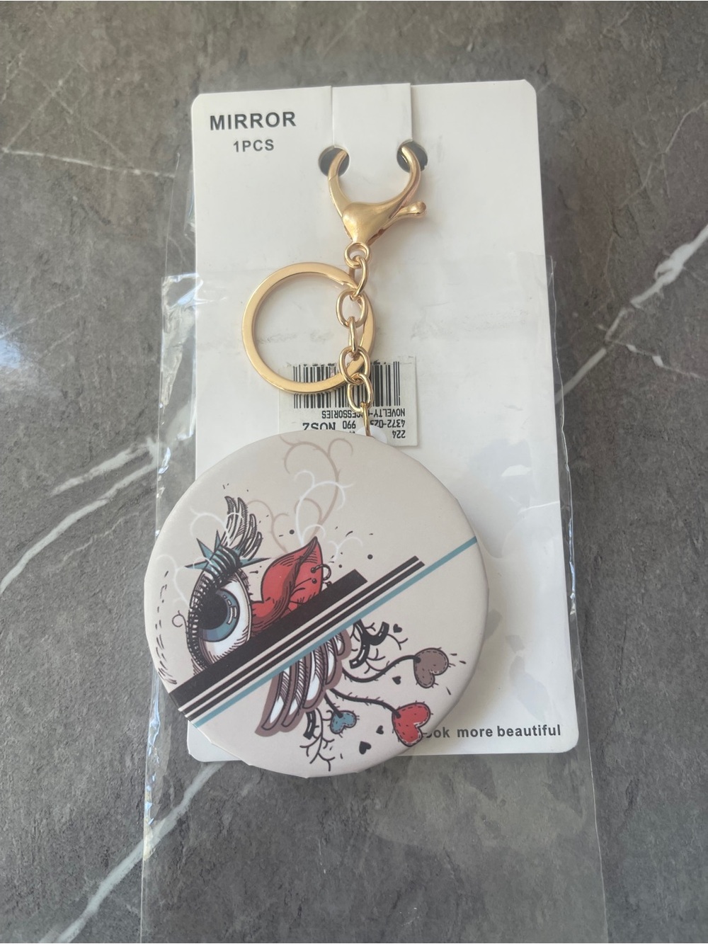 Artistic Compact Mirror Keychain with Red & Blue Design